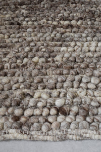 Tapis 100% en laine naturelle - melange de laine (chiné), effet bouclé